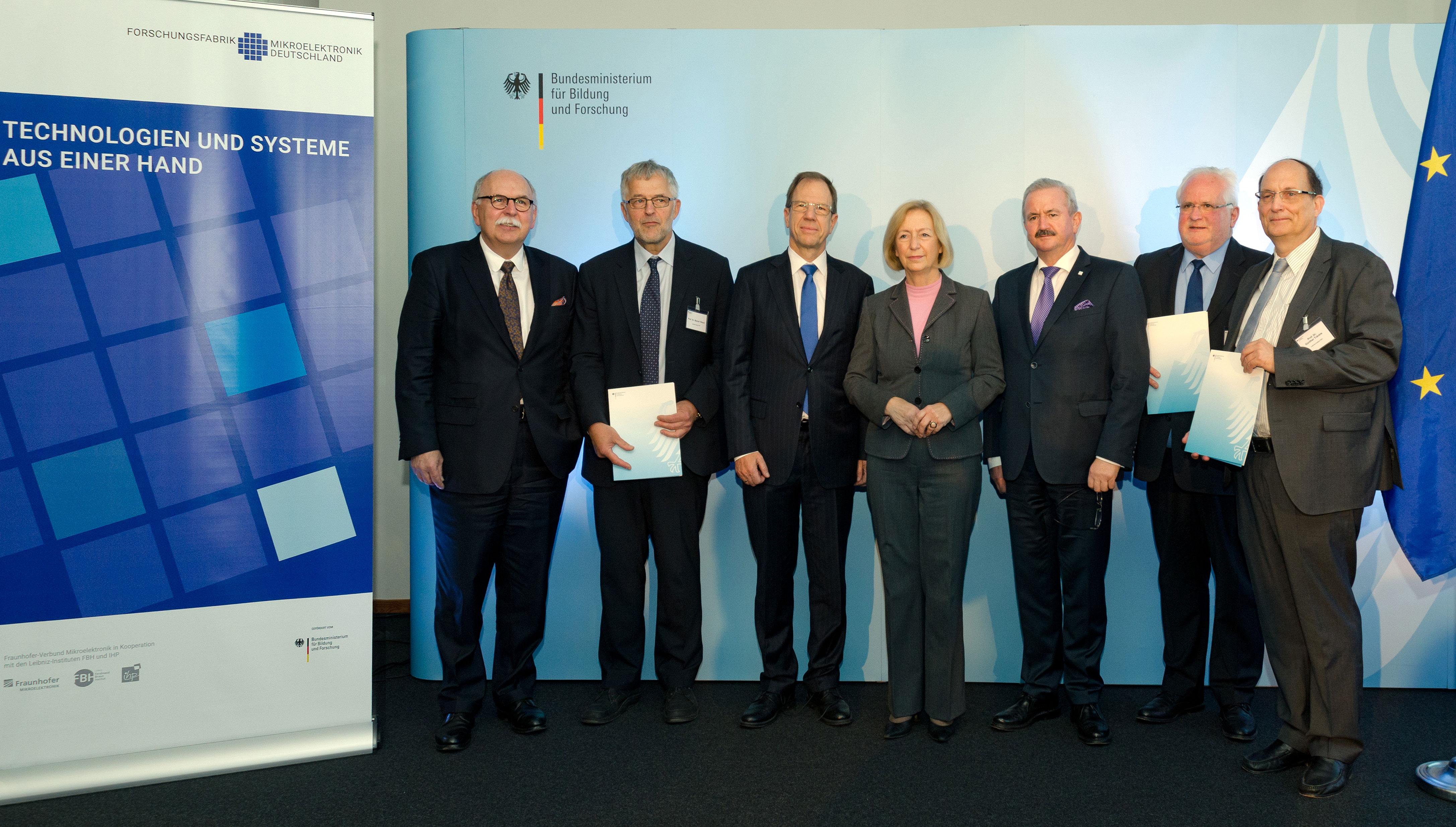 After handing over the grant approvals issued by the Federal Ministry of Education and Research (L-R):  Prof. Matthias Kleiner, President Leibniz Association, Prof. Bernd Tillack, Institute Director Leibniz Institute for Innovations for High Performance Microelectronics (IHP), Dr. Reinhard Ploss, CEO of Infineon AG, Prof. Johanna Wanka, Federal Research Minister, Prof. Reimund Neugebauer, President Fraunhofer-Gesellschaft, Prof. Hubert Lakner, Chairman Fraunhofer Group for Microelectronics, Prof. Günther Tränkle, Institute Director Ferdinand Braun Institute, Leibniz-Institut für Höchstfrequenztechnik (FBH).