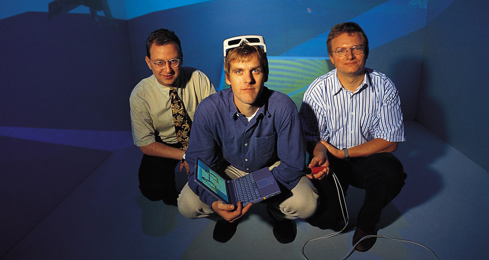 Joseph-von-Fraunhofer-Preis 1999: Andreas Rößler, Roland Blach, Ulrich Häfner (v.l.n.r.:). Virtuelle Realität: Lightning ist ein robustes Softwaresystem, mit dem sich unterschiedliche interaktive 3D-Szenarien flexibel und ohne großen Aufwand erstellen und in beliebige Anwendungen integrieren lassen.