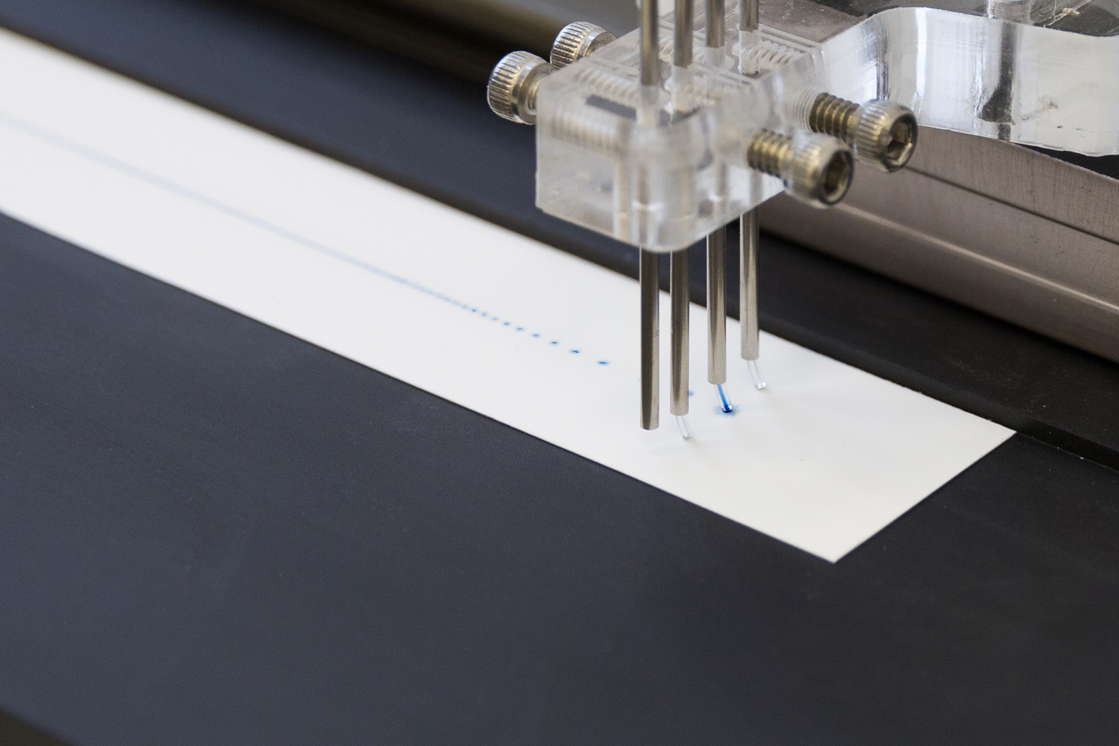 Production of ImmuStick: Application of immune receptors onto the test strip. 