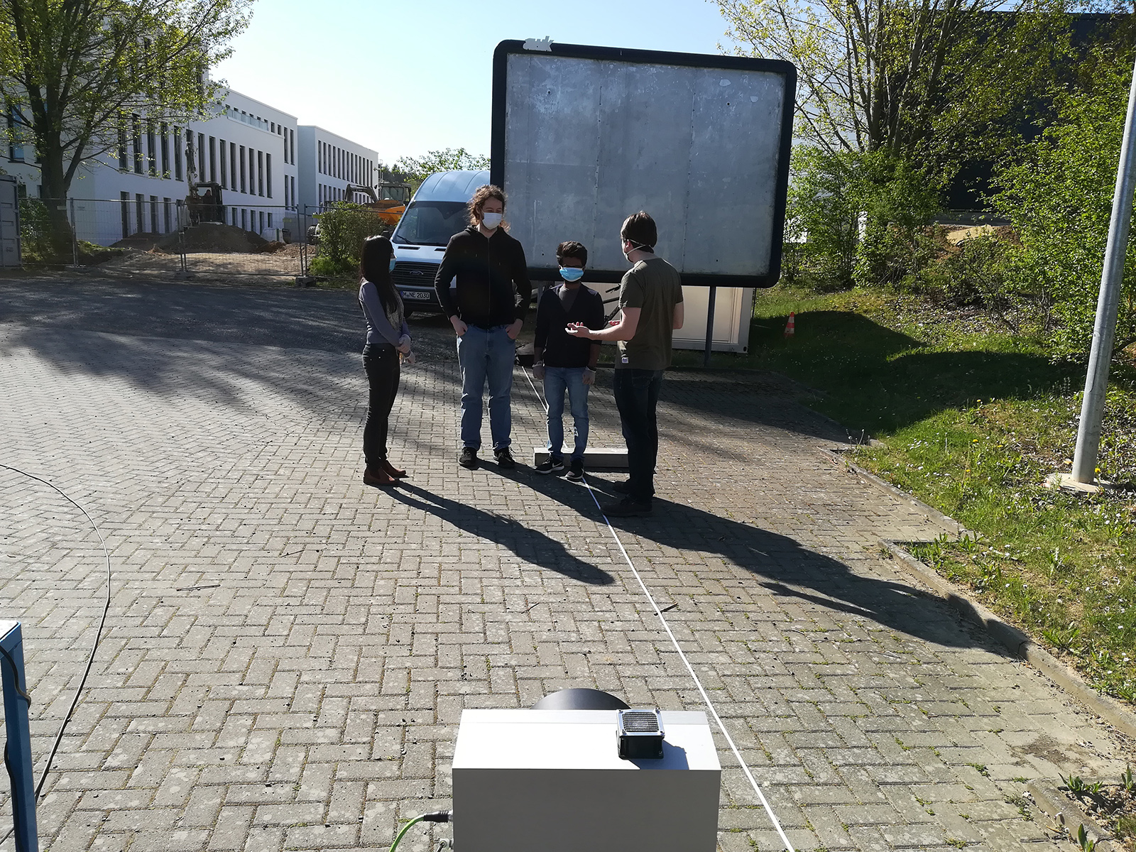 Testing the radar-based detection of the vital parameters of a group of people as they move naturally in an environment at Fraunhofer FHR (from left to right: Siying Wang, Alexander Bauer, Manjunath Thindlu Rudrappa and Reinhold Herschel).