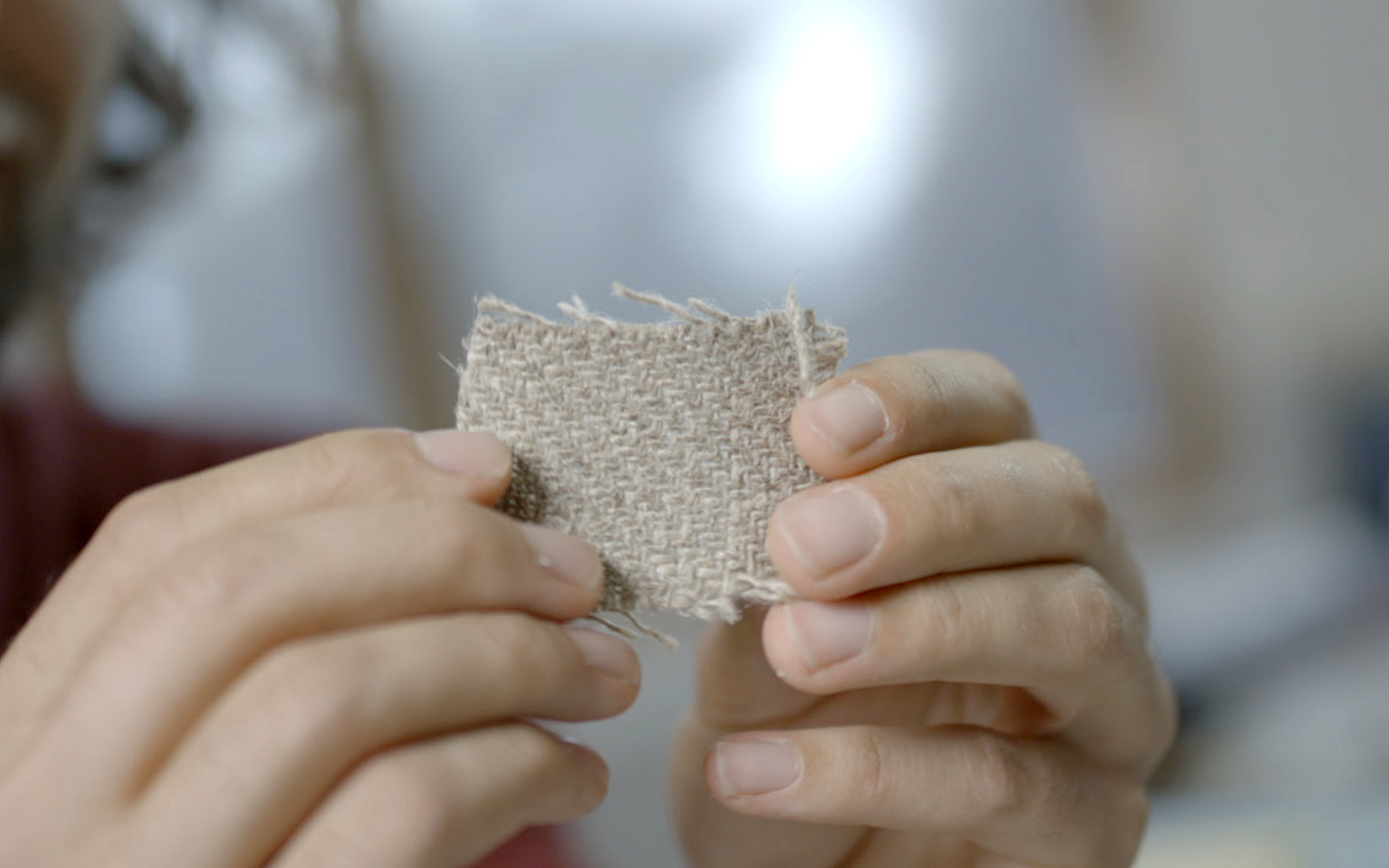 Textile made of flax fibers inserted into the board as reinforcement.