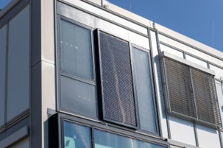 Exterior view of the RE modular facade with a floor-to-ceiling PV element.